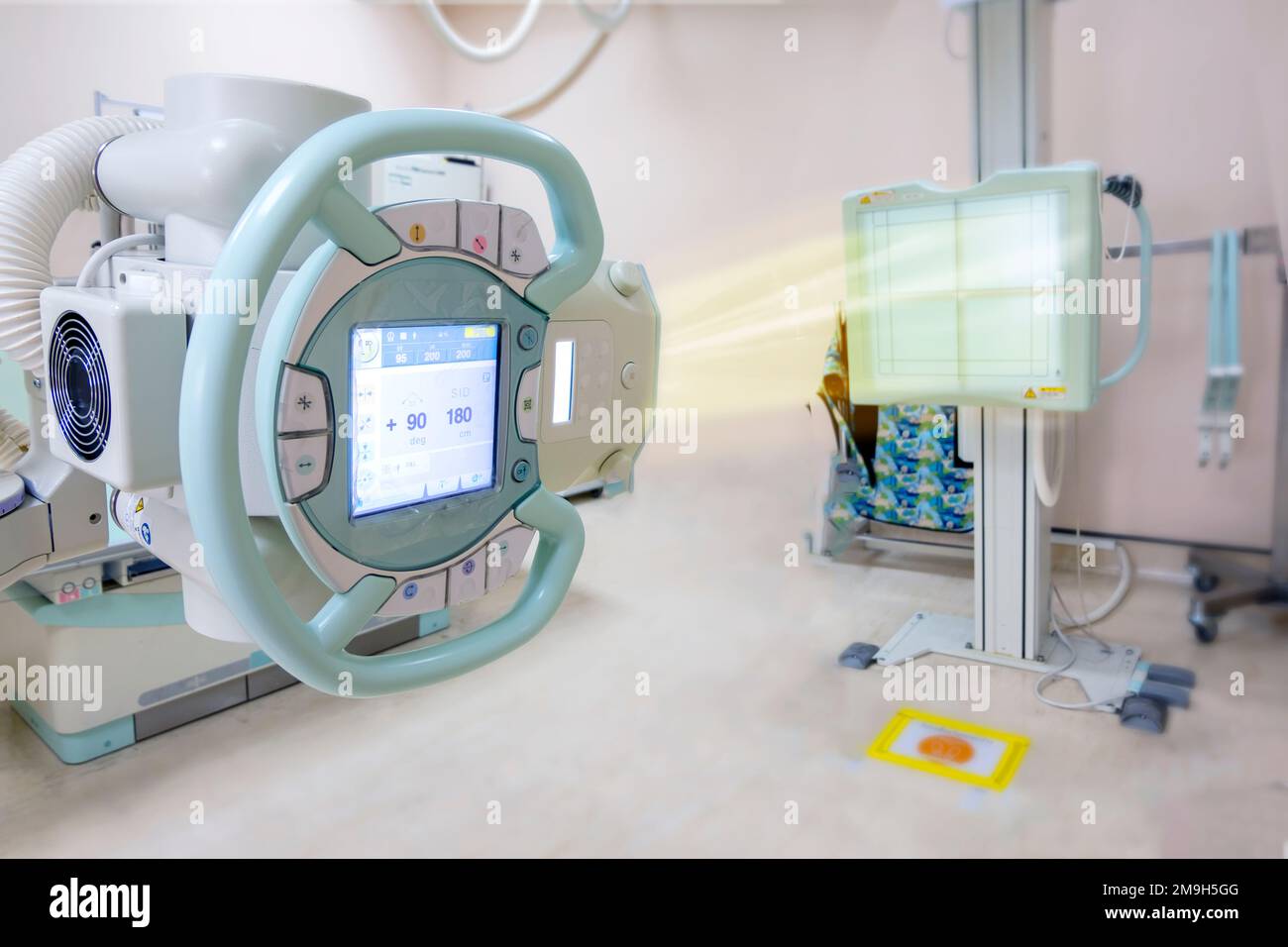 Xray generator tube with monitor or Xray general device with Bucky stand in radiology .modern