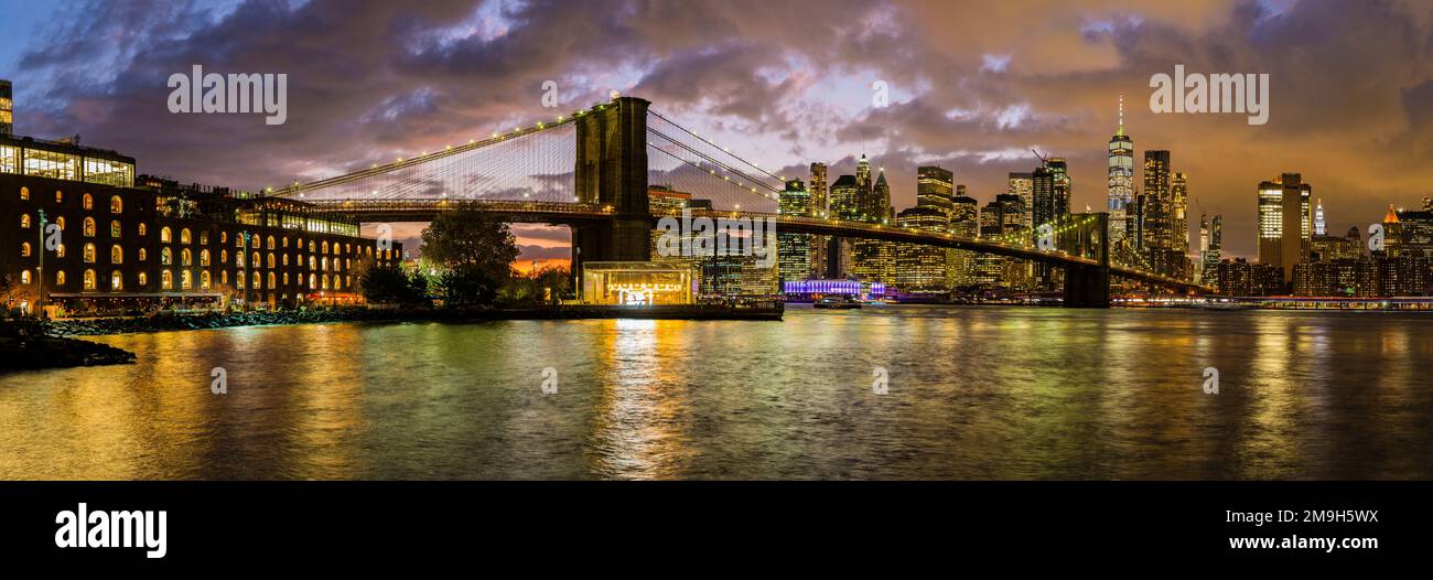 Brooklyn Bridge and Manhattan skyline at sunset, New York City, USA Stock Photo