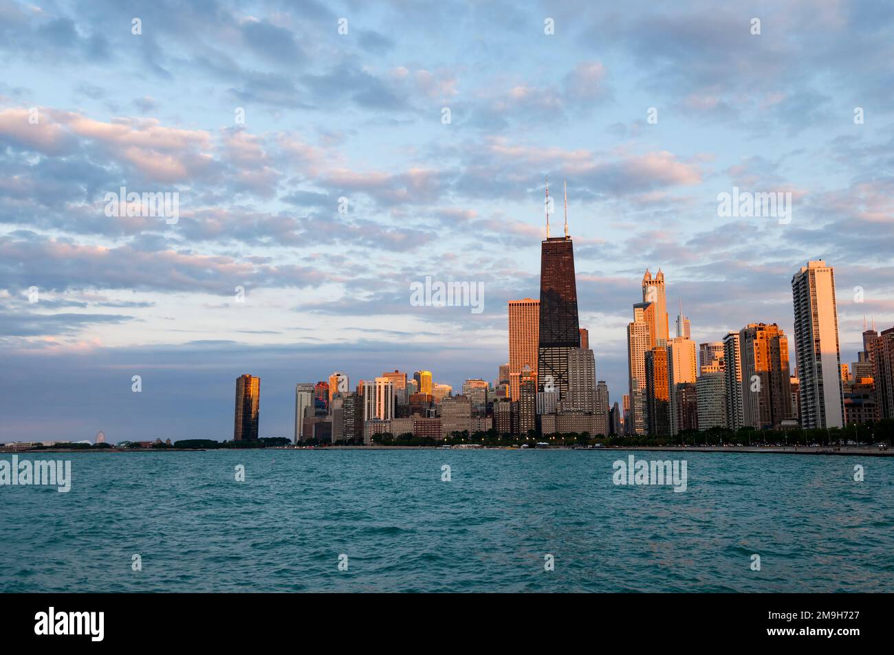 City skyline at sunset, Chicago, Illinois, USA Stock Photo