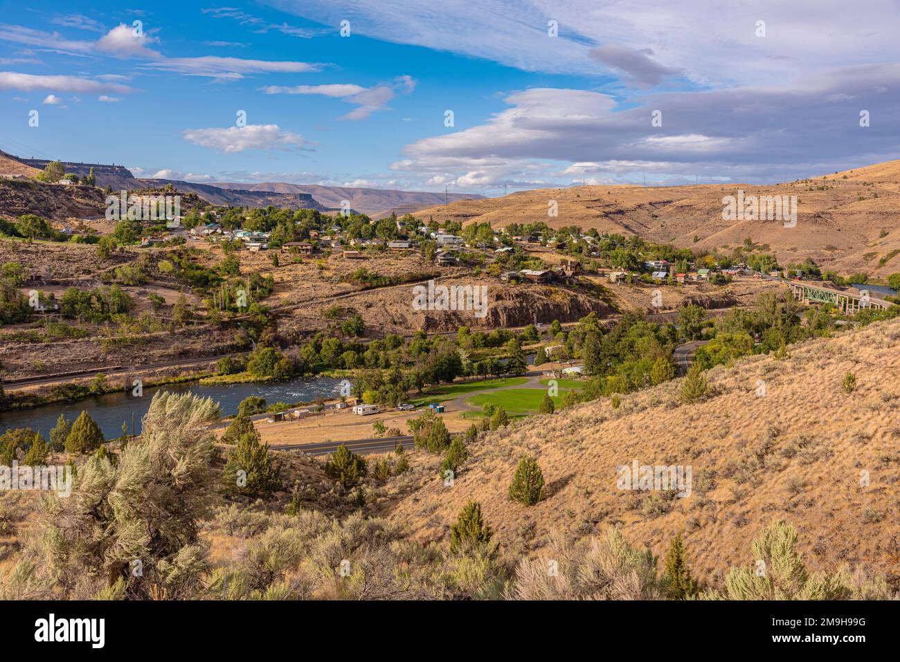 Landscape with distant view of city, Maupin, Oregon, USA Stock Photo