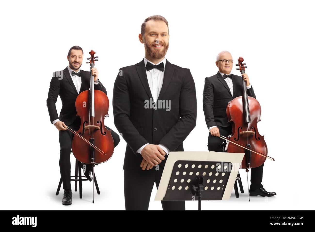 Male cello players and a music conductor posing isolated on white background Stock Photo