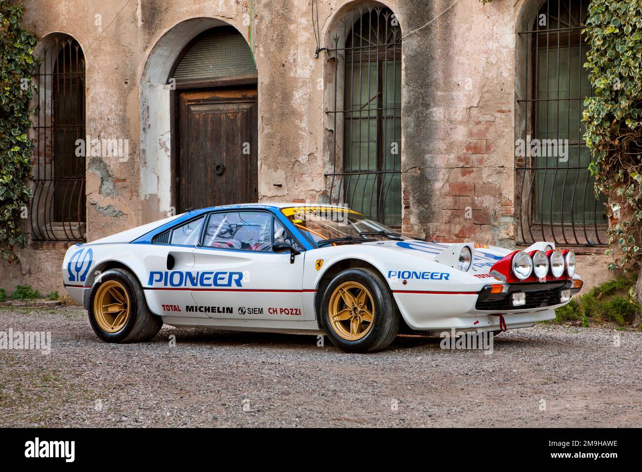 Side view of Ferrari 308GTB GR 4 rally car parked on street Stock Photo