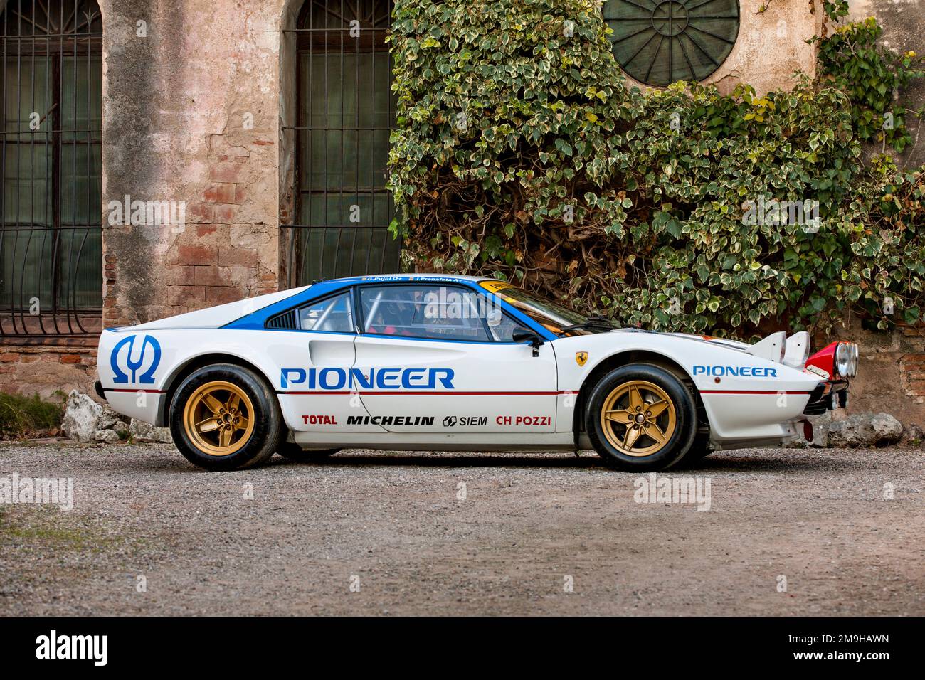 Side view of Ferrari 308GTB GR 4 rally car parked on street Stock Photo