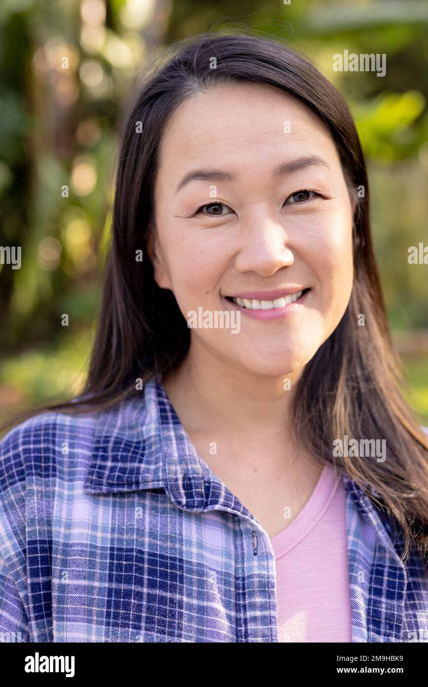 Attractive happy asian woman hi-res stock photography and images - Alamy