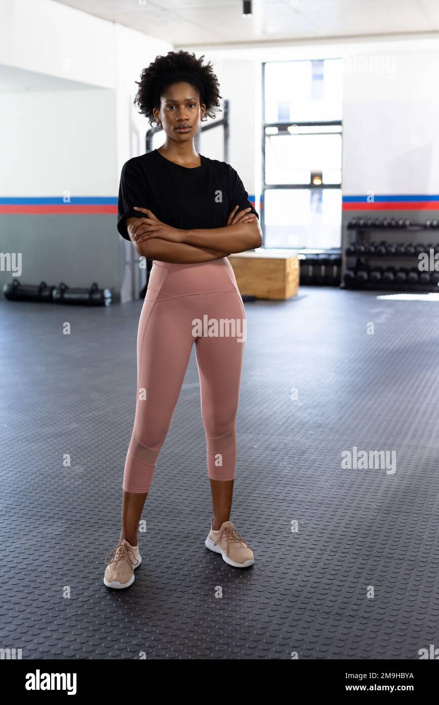 Muscular woman arms crossed hi-res stock photography and images - Alamy