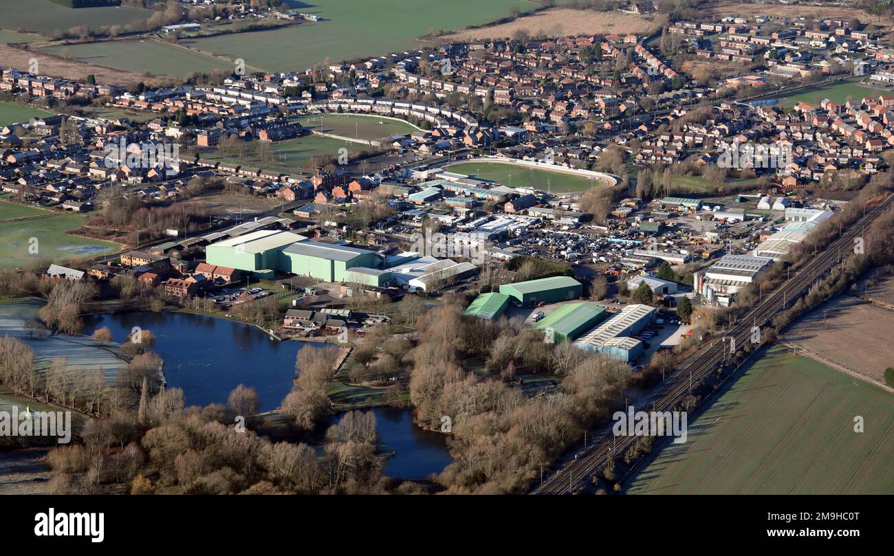Aerial view of industry on Hoyle Mill Road, Kinsley near Pontefract, West Yorkshire, with Hemsworth Water Park in the left foreground Stock Photo