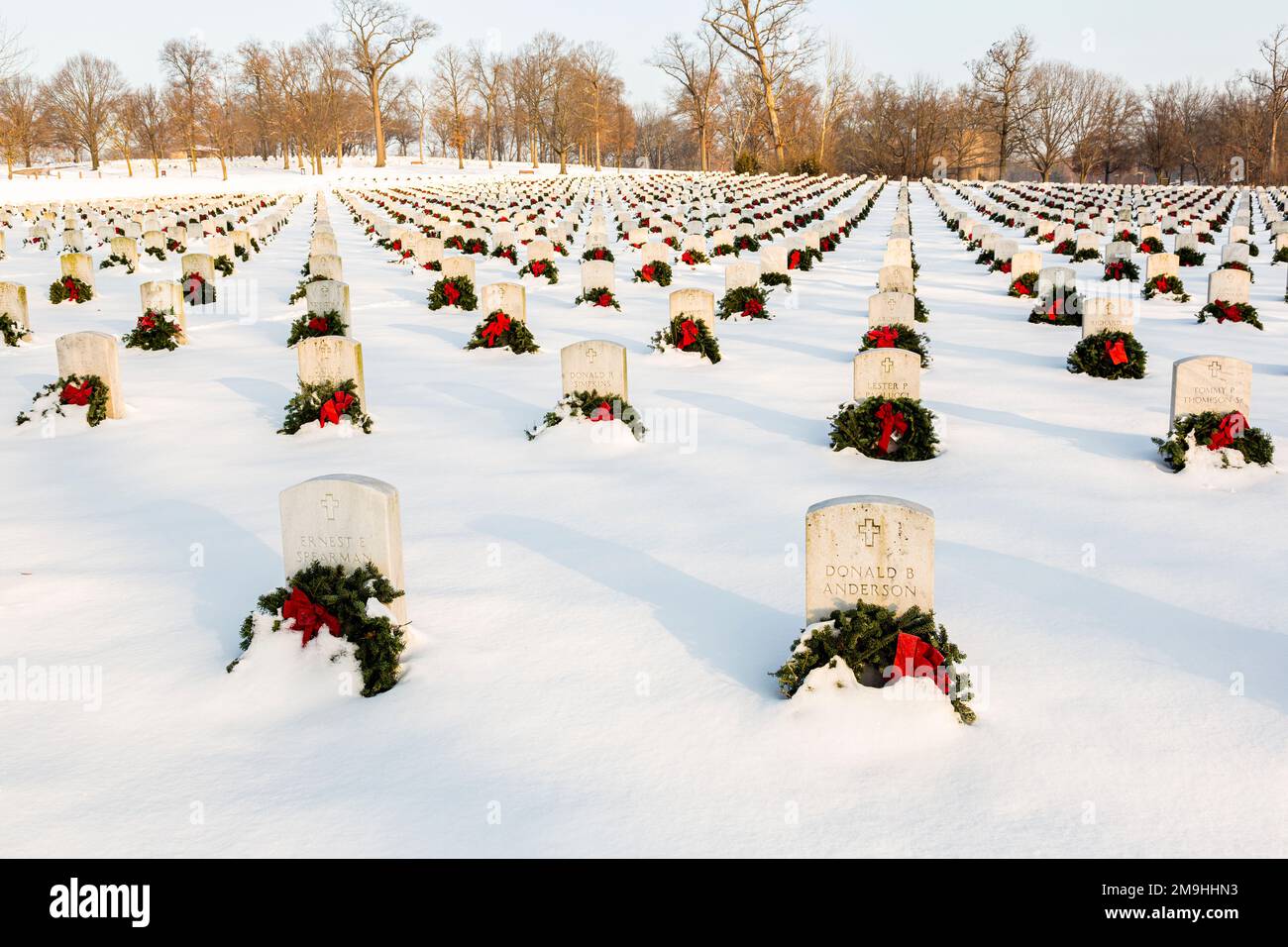 Wreaths on graves in winter, Jefferson Barracks National Cemetery, St. Louis, Missouri, USA Stock Photo