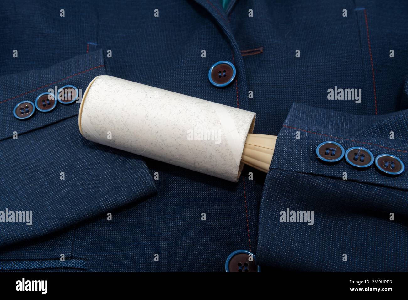 Roller for cleaning clothes from dust, debris and dirt. Clothing care