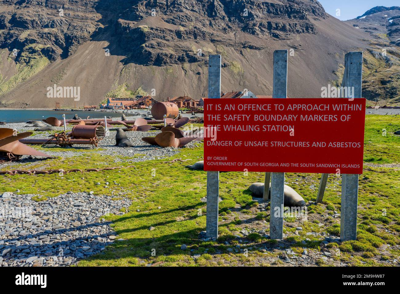 Asbestos warning sign on the beach in Stromness Bay on South