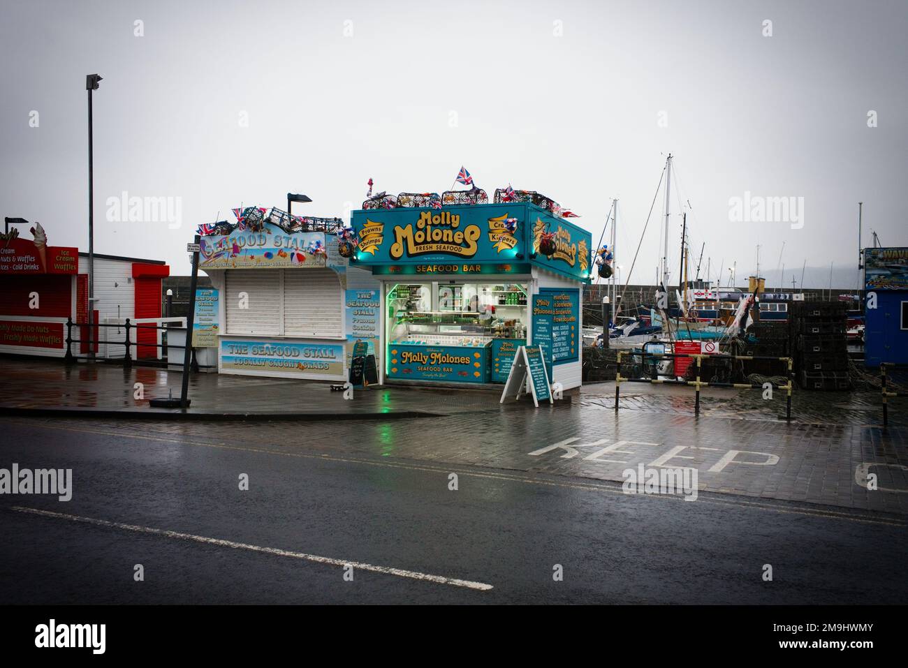 Seafood stall at Scarborough harbourside on a winter weekend afternoon Stock Photo