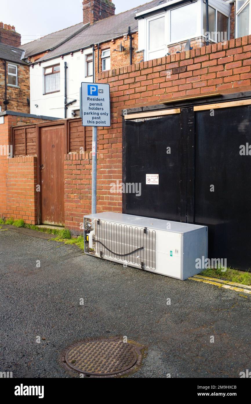 Urban flytipping of a fridge freezer outside a house in Scarborough