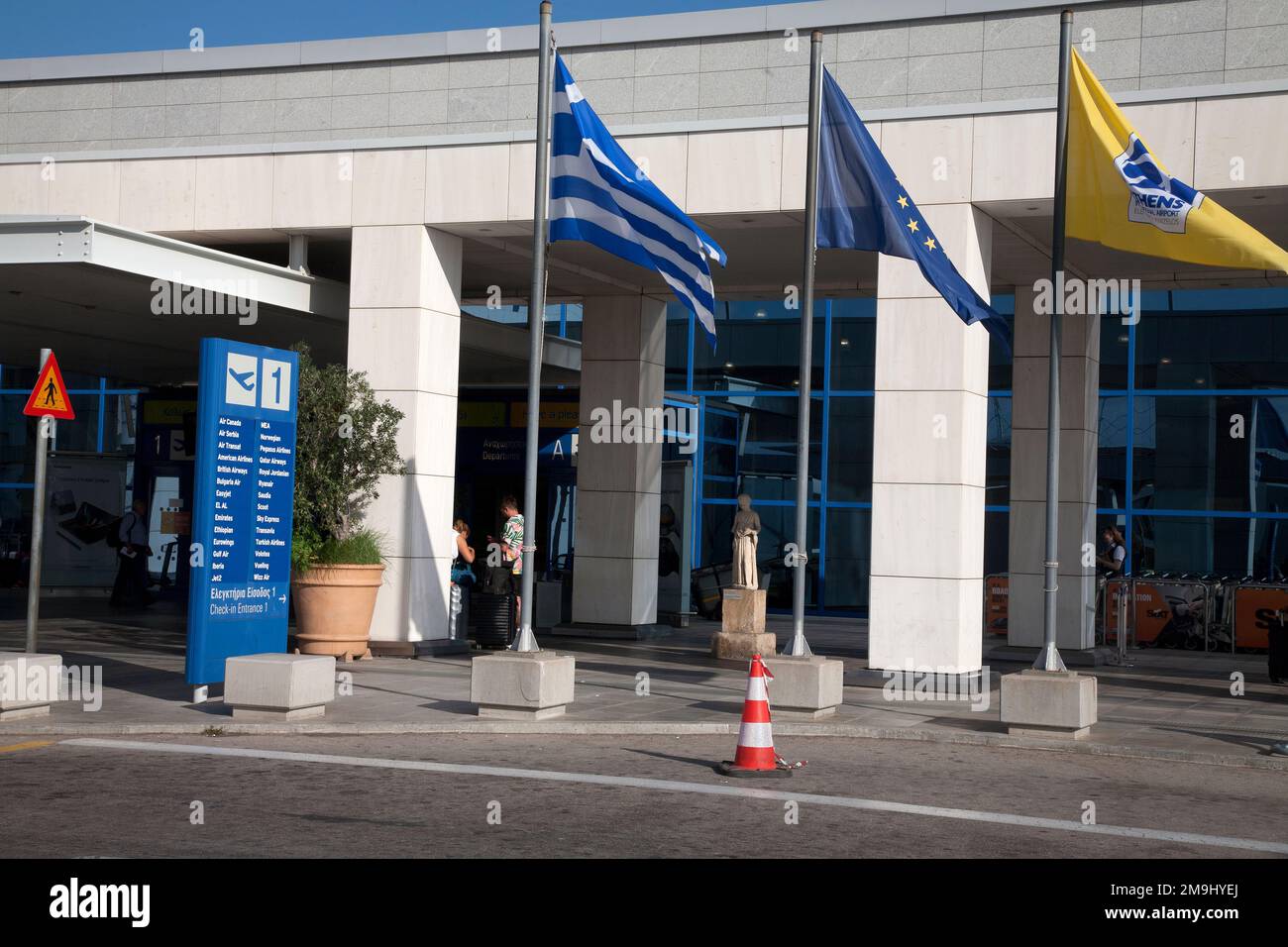 people outside entrance to departure hall Athens International Airport Eleftherios Venizelos Athens Greece Stock Photo
