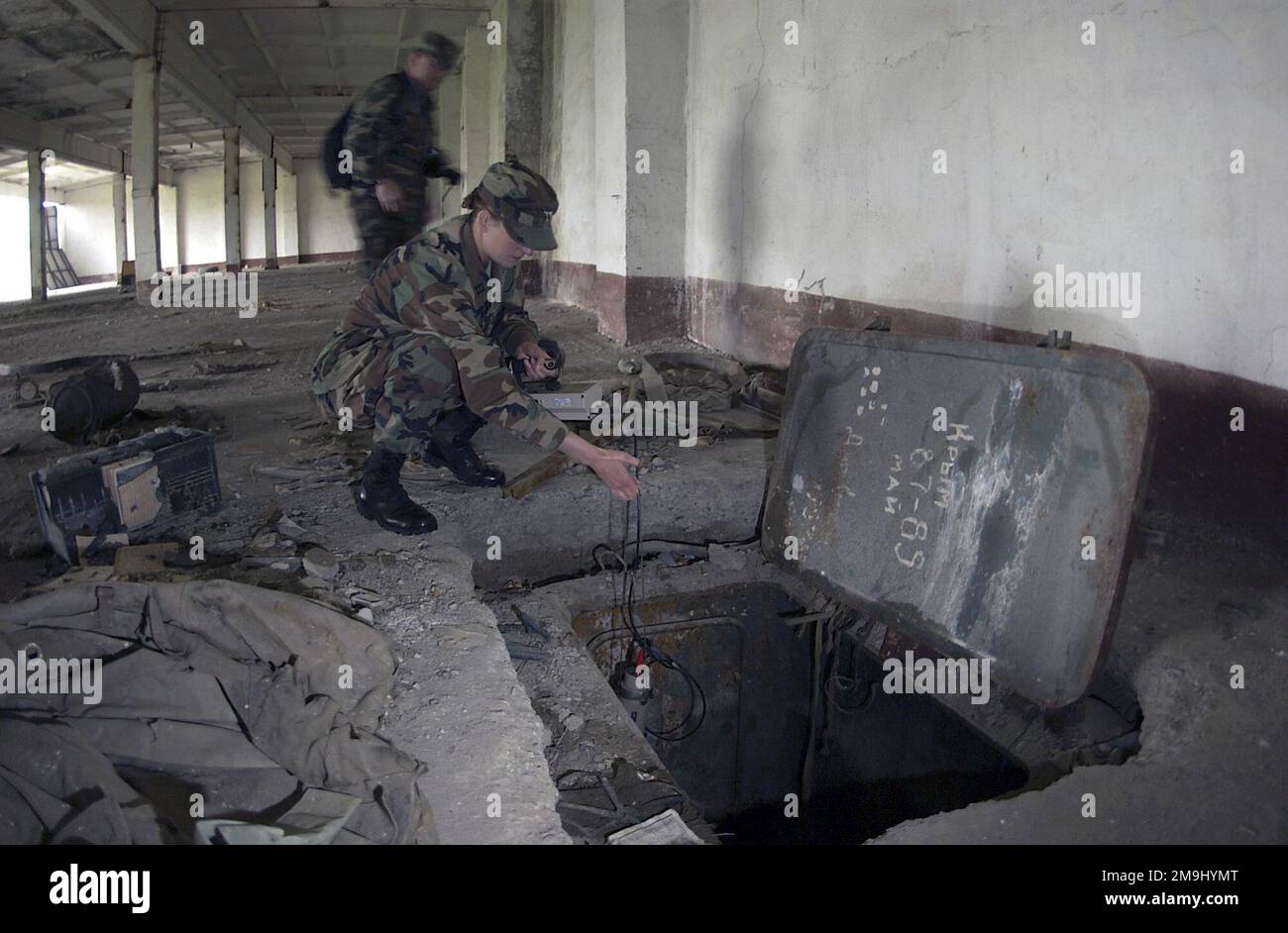 020524-F-6701P-004. [Complete] Scene Caption: US Army (USA) Captain ...