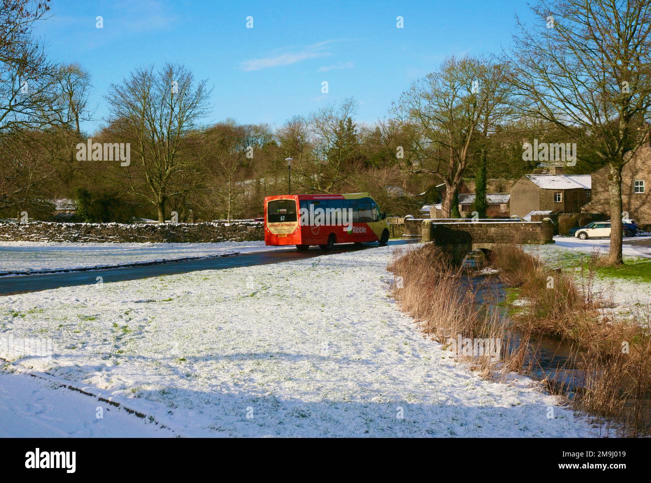 A view of the local bus as it drives through the village, Downham