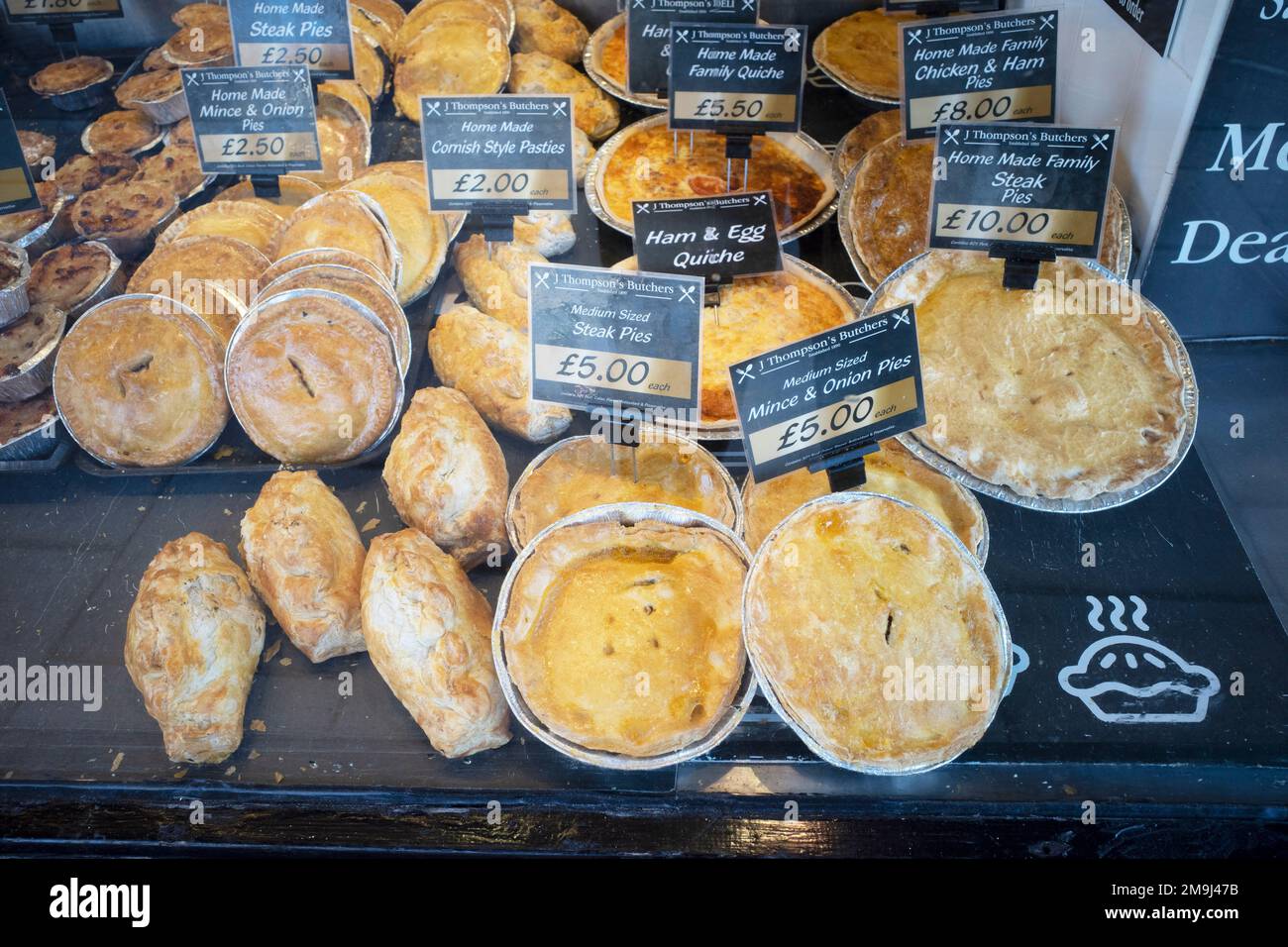 J Thompson's Butchers  shop window in Northallerton  with a display of various types of meat pies and pasties Stock Photo
