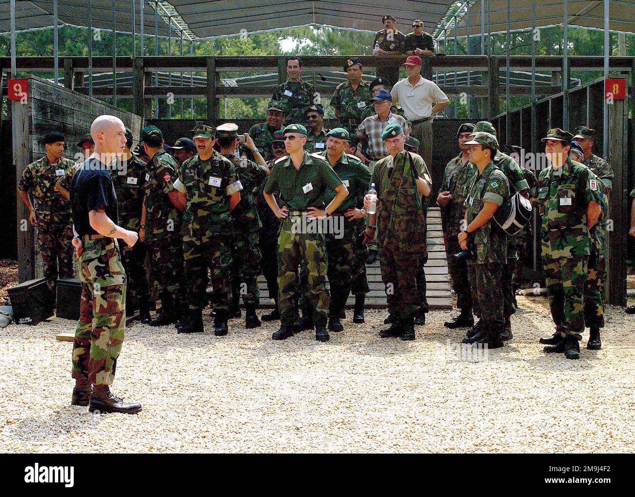 While visiting US Marine Corps (USMC) Recruit Depot, Marine Corps Base (MCB) Parris Island, South Carolina, Marine leaders from 30 nations attending the 1ST Inaugural World Wide Commandants Conference, listen as an instructor explains what happens when recruits get to the Reaction Course at the Crucible. Base: Usmc Recruit Depot,Parris Island State: South Carolina (SC) Country: United States Of America (USA) Stock Photo