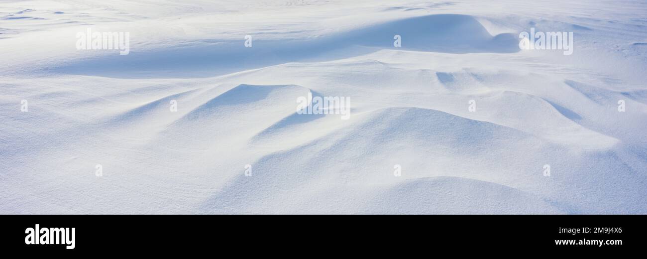 White snow sculpted by wind Stock Photo