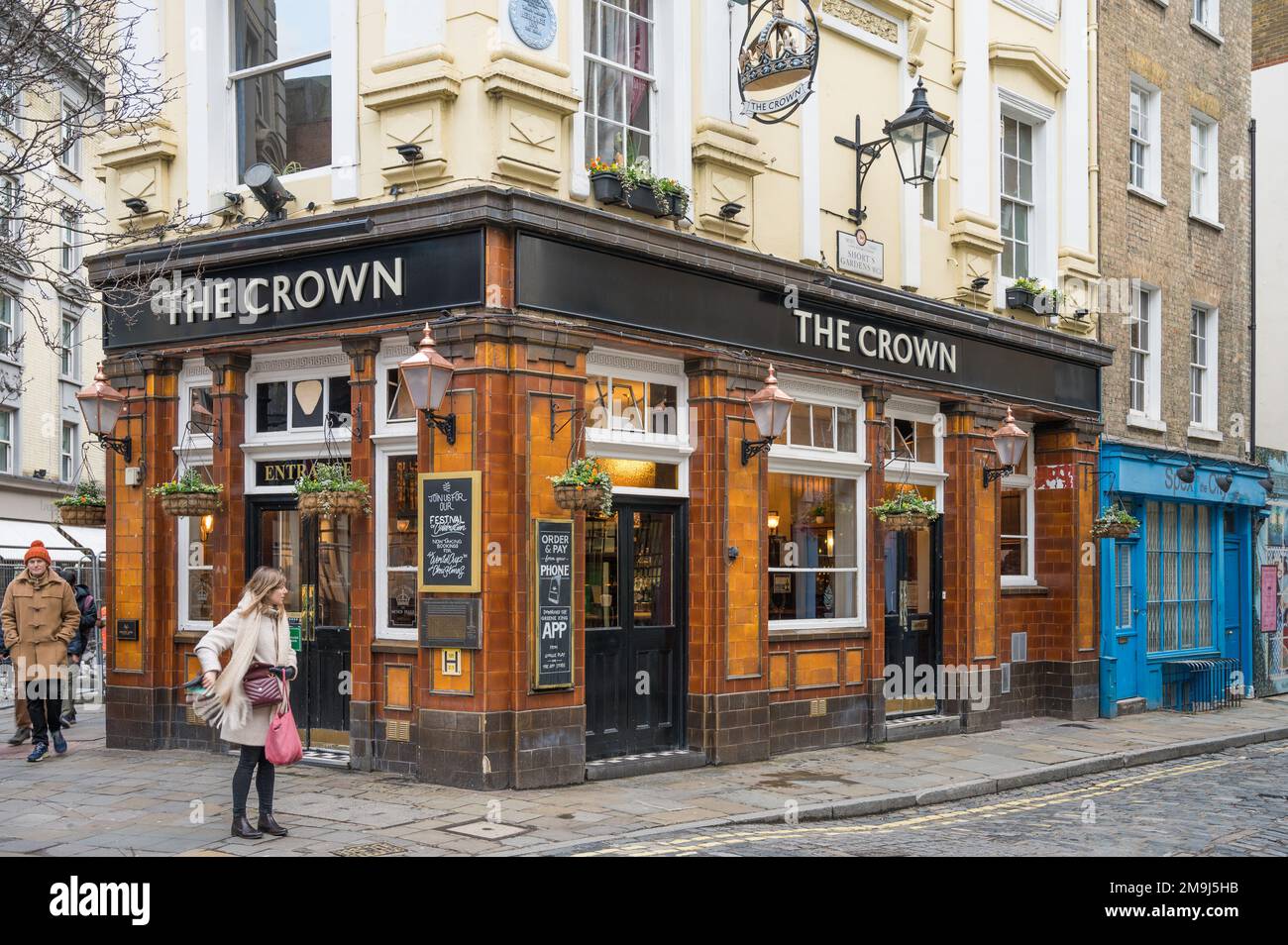 The Crown, a Greene King corner pub on Monmouth Street, Seven Dials