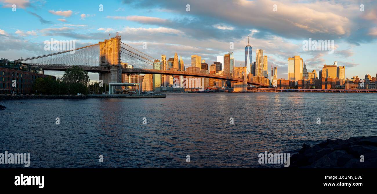Bridge over river, and city skyline, Brooklyn Bridge, Manhattan, New York City, New York, USA Stock Photo