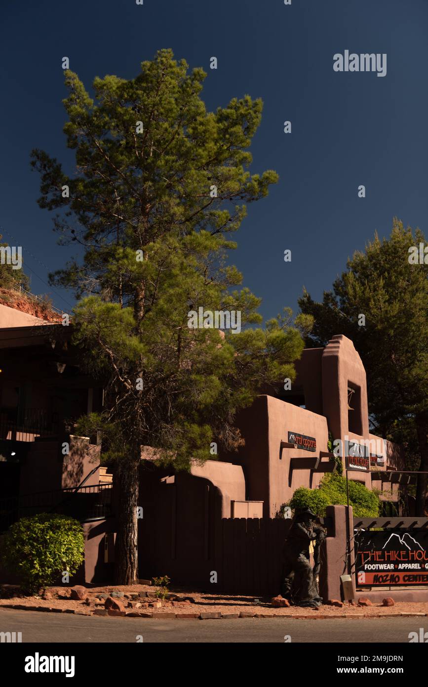 A vertical shot of Adobe styled commercial buildings in downtown Sedona