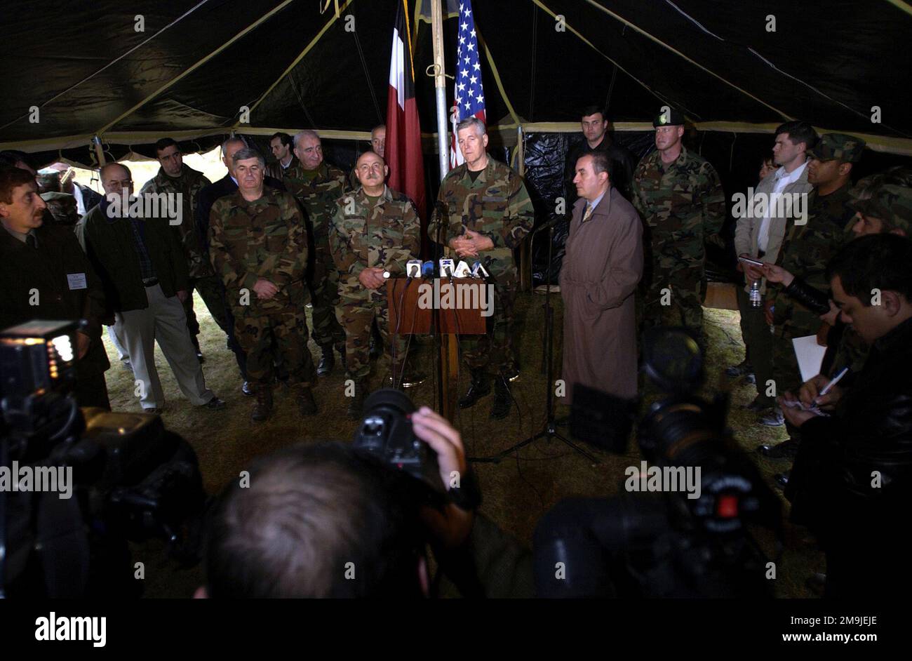 021125-F-6701P-048. [Complete] Scene Caption: At the Advanced Operational Base for the Georgia Train and Equip Program in Krtsanisi, Republic of Georgia, US Air Force (USAF) General (GEN) Richard B. Myers (center), Chairman of the Joint Chiefs of STAFF (JCS), and General Lieutenant David Tevzadze, Georgian Minister of Defense, speak to international press after a memorial dedication ceremony honoring the victims of the September 11th terrorist attack. General Myers is touring the Georgia Train and Equip Program (GTEP) complex and training grounds along with meeting top military officials and t Stock Photo