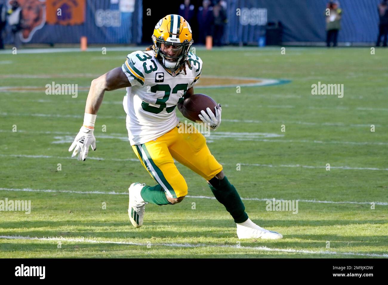 Green Bay Packers running back Aaron Jones carries the ball during an