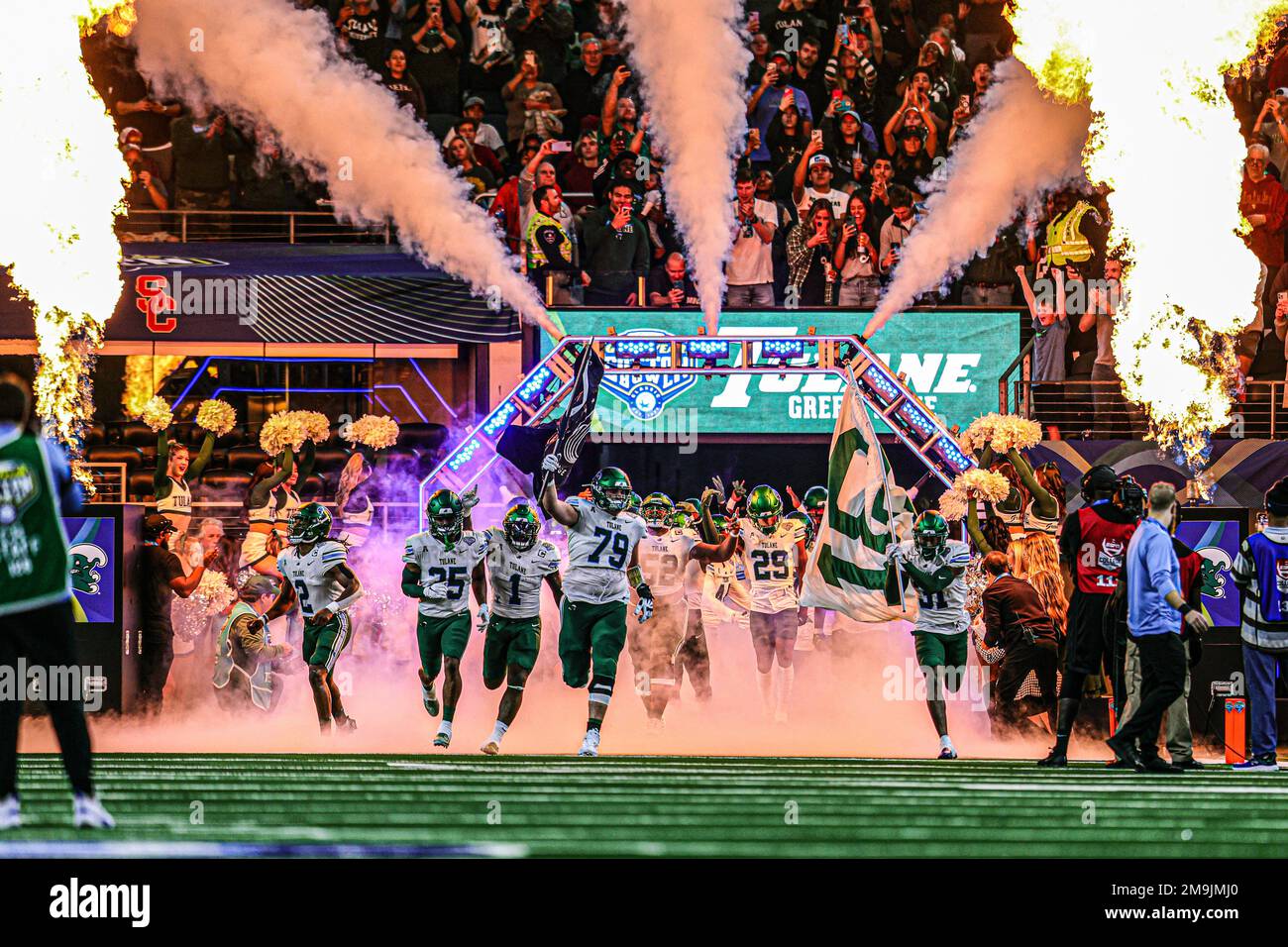 Tulane Green Wave come out of the tunnel and take the field during the 87th Goodyear Cotton Bowl Classic at AT&T Stadium on Monday, January 2, 2023 in Stock Photo