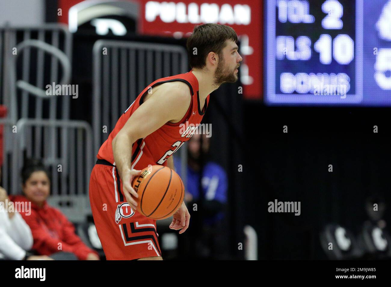 Utah guard Rollie Worster controls the ball during overtime of an NCAA