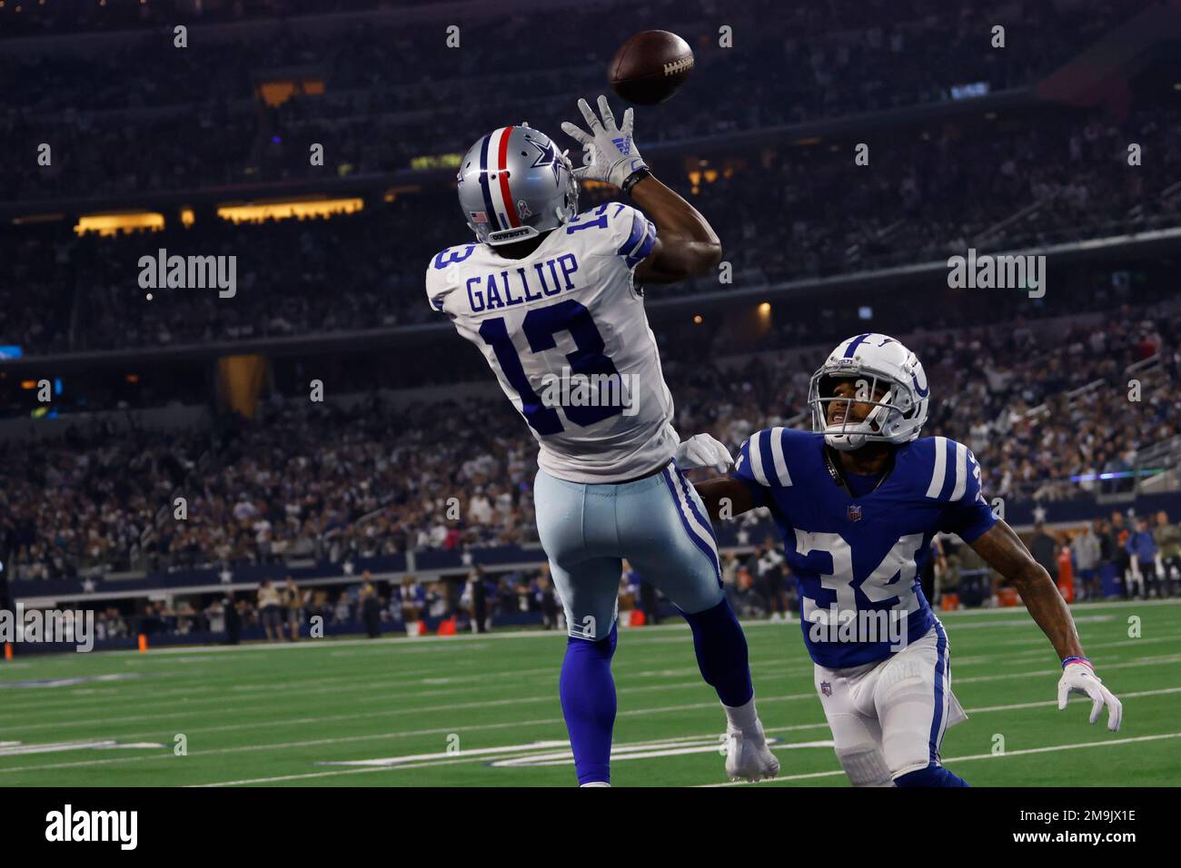 Dallas Cowboys' Michael Gallup (13) makes a touchdown catch against  Indianapolis Colts' Isaiah Rodgers (34) during