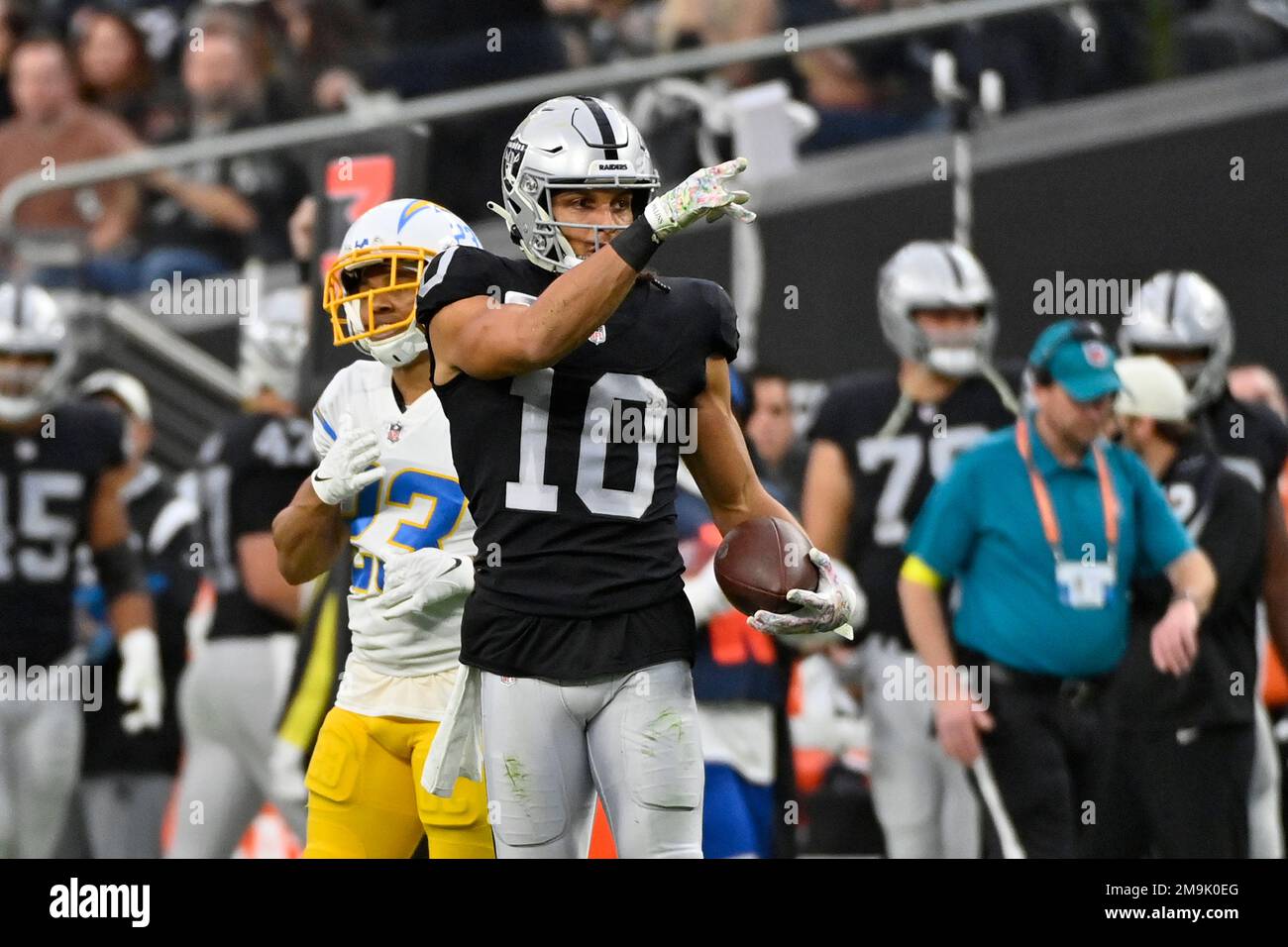 Las Vegas Raiders wide receiver Mack Hollins (10) reacts after a first