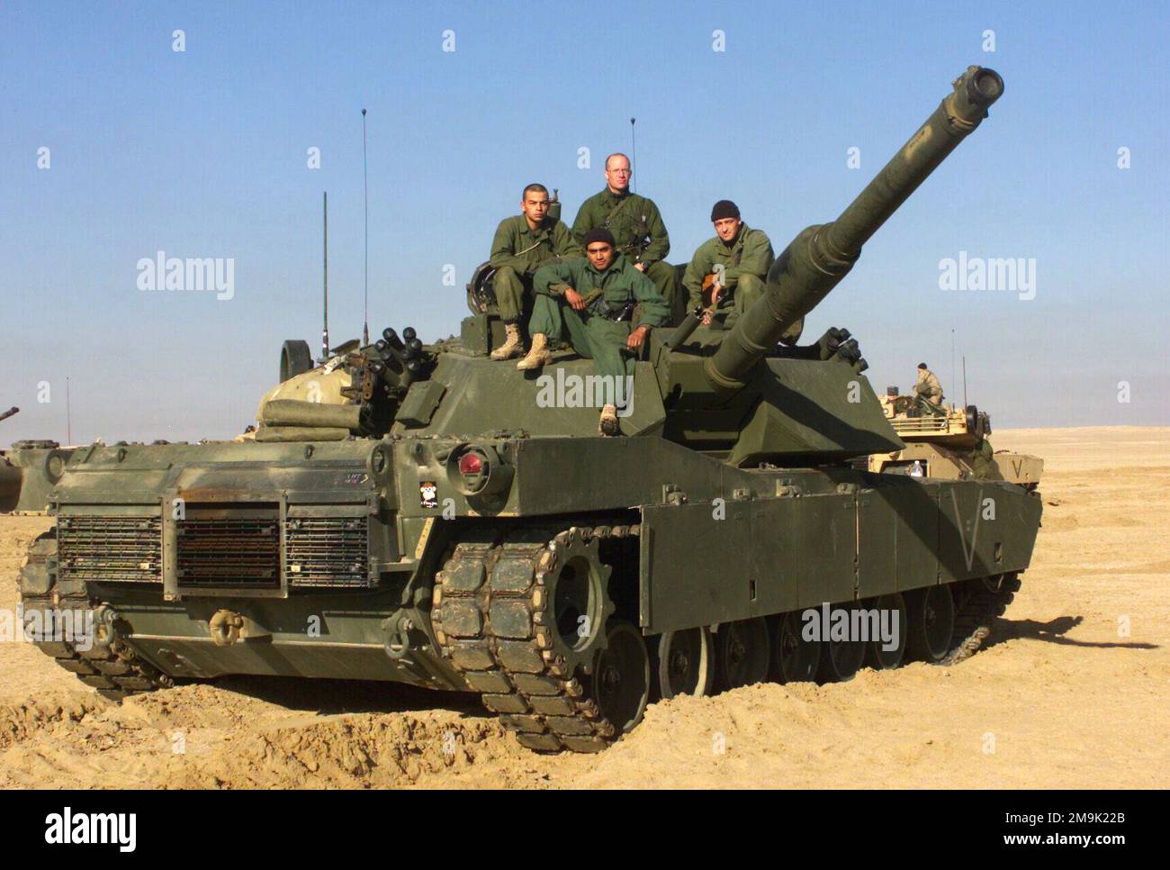 STAFF Sergeant (SSGT) Thomas Leagon, (center rear), USMC, tank