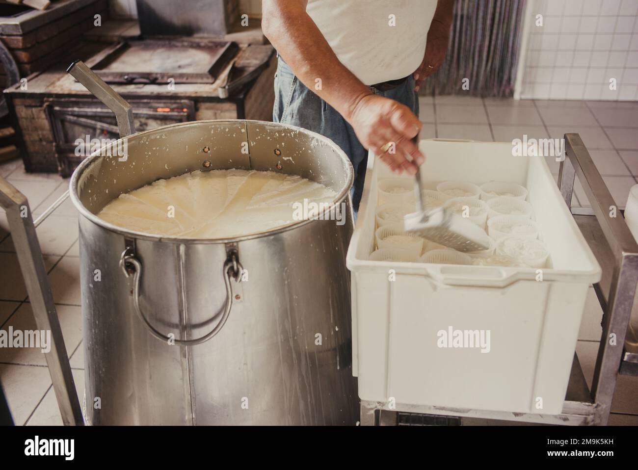 Making of ricotta cheese in a traditional way in Sicily Stock Photo Alamy