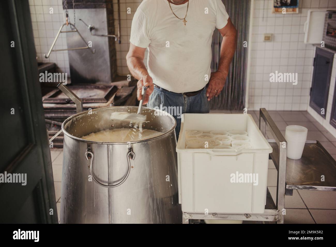 Making of ricotta cheese in a traditional way in Sicily Stock Photo Alamy