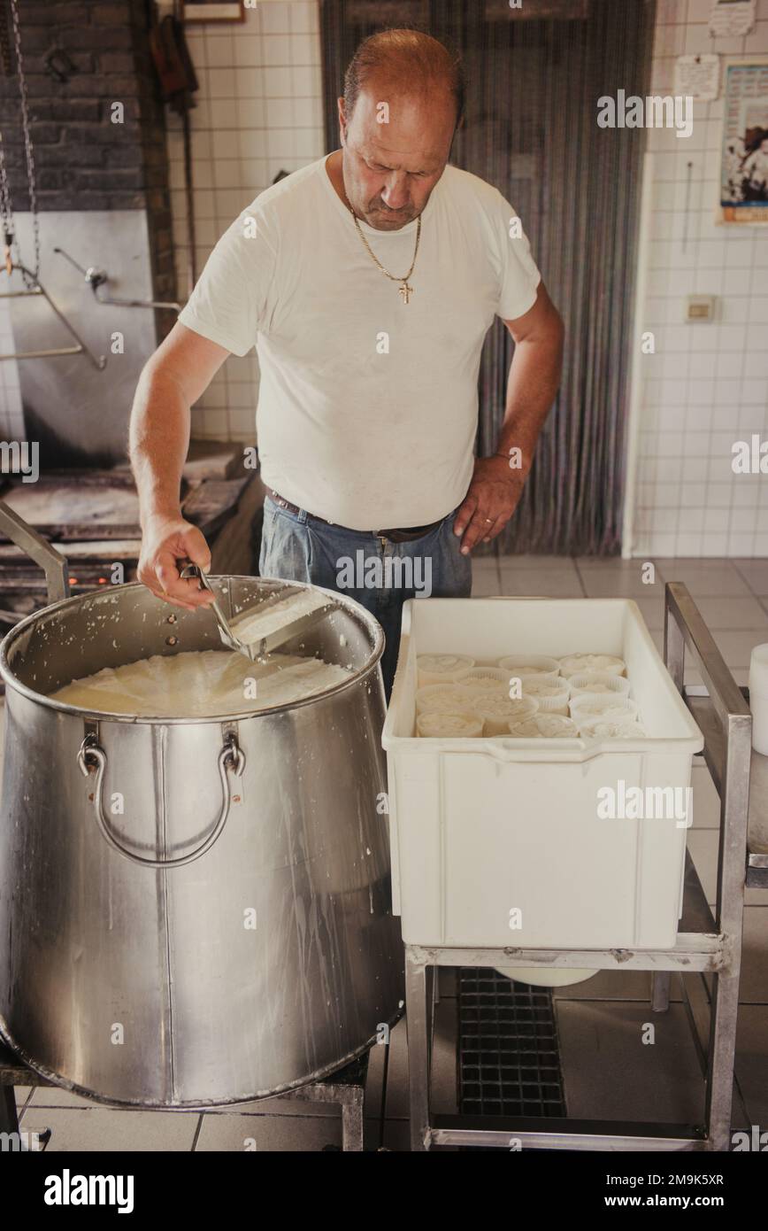 Making of ricotta cheese in a traditional way in Sicily Stock Photo Alamy