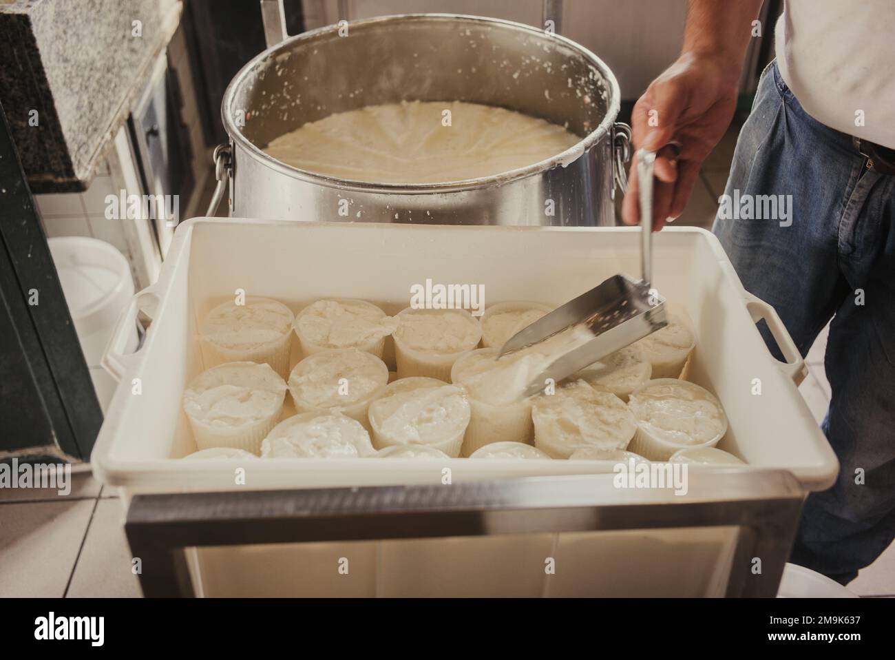 Making of ricotta cheese in a traditional way in Sicily Stock Photo Alamy