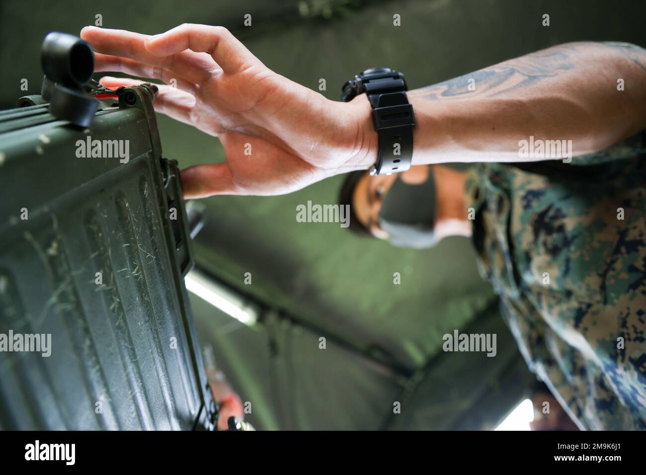 U.S. Marine Sgt. Leal Lazaro, a radio operator with Marine Wing ...