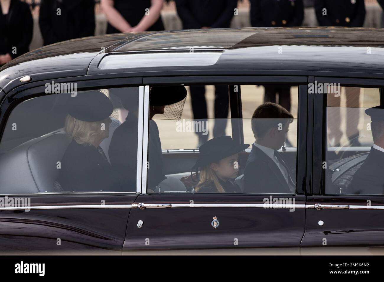 Prince George and Princess Charlotte, travelled by royal car with the their mother Princess of Wales, and Camilla, after the Queen's Funeral Service. Stock Photo