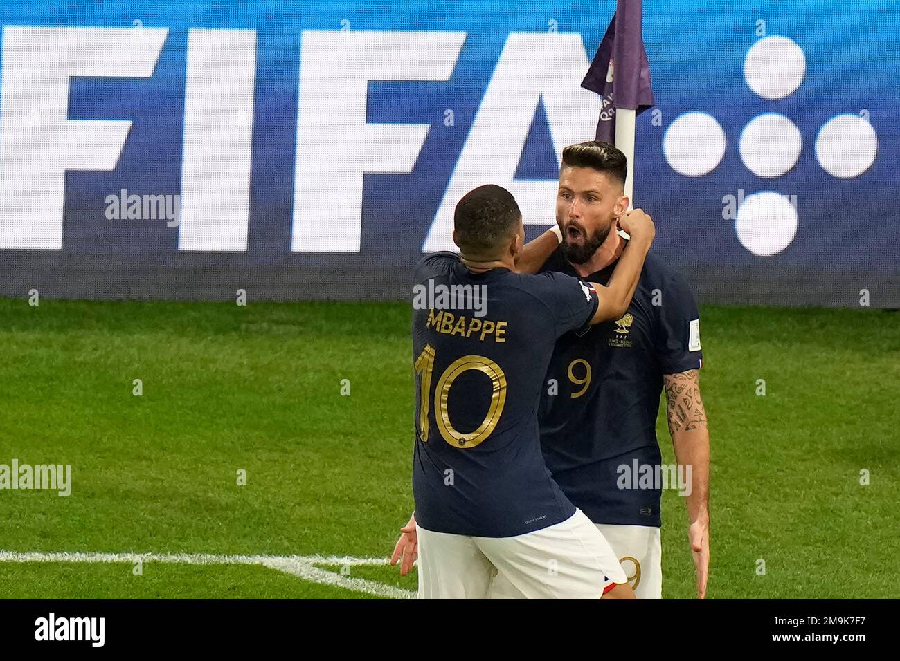 France's Olivier Giroud, right, celebrates with teammate Kylian Mbappe ...