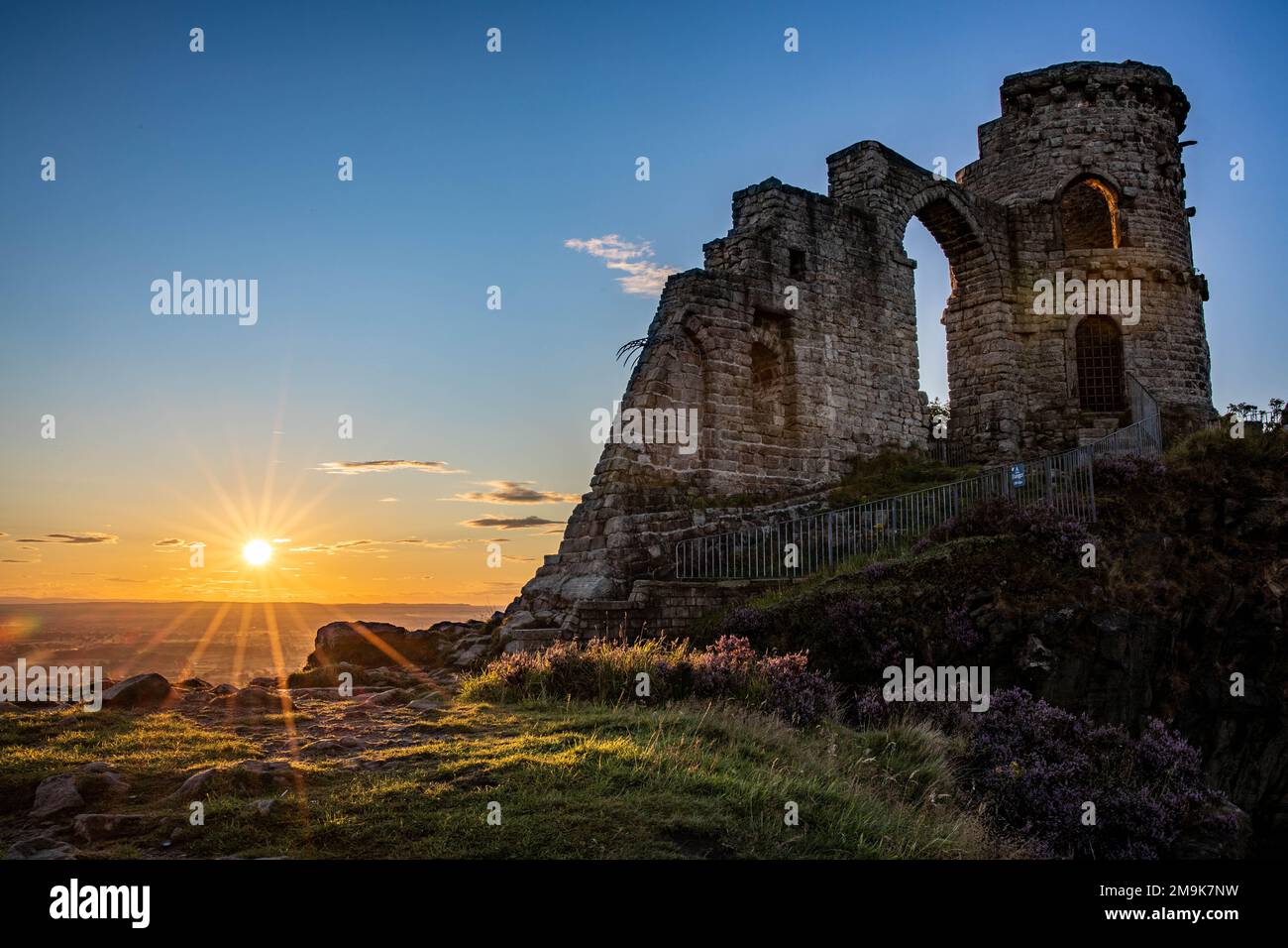 The Ancient Mow Cop Castle At Sunset With Sun Star And Blue Sky In 