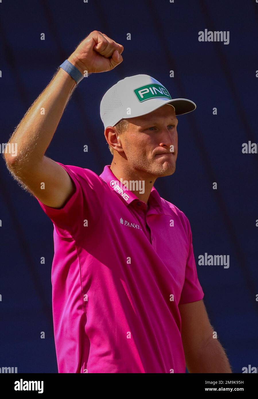 Poland's Adrian Meronk celebrates on the 18th hole after winning the