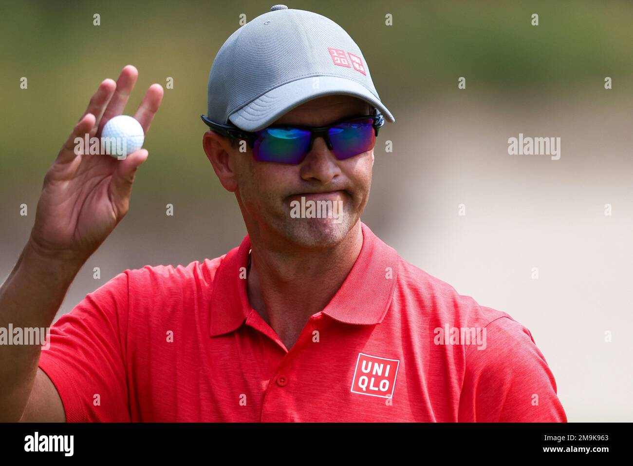 Australia's Adam Scott acknowledges the crowd on the 13th hole during