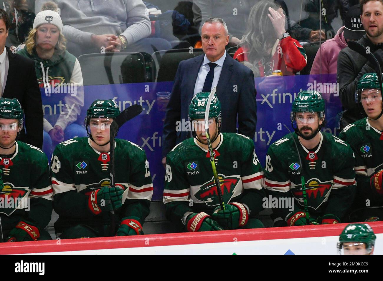 Minnesota Wild head coach Dean Evason, center, watches from the bench