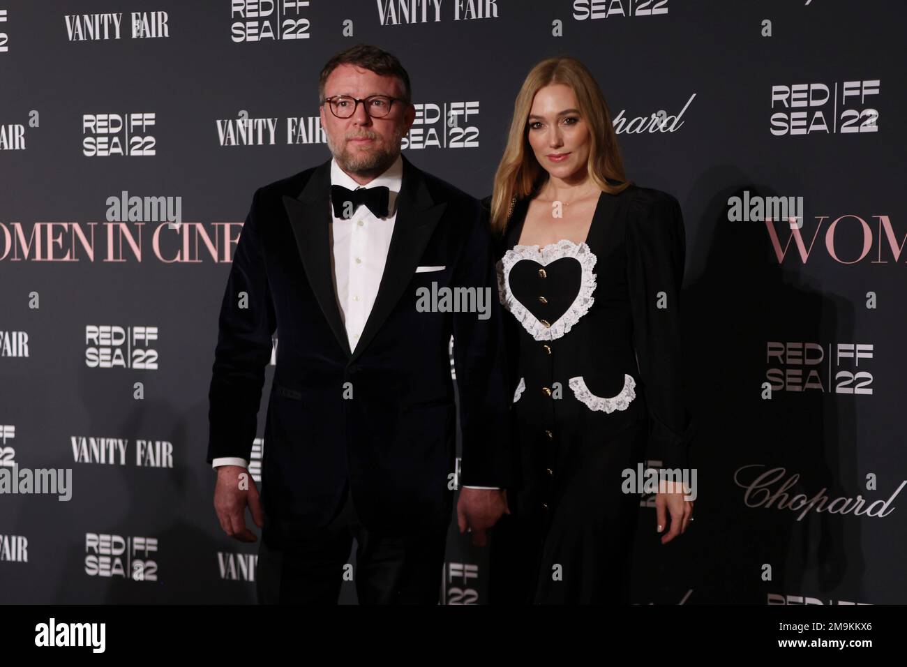 Guy Ritchie and Jacqui Ainsley pose for photographers upon arrival at ...