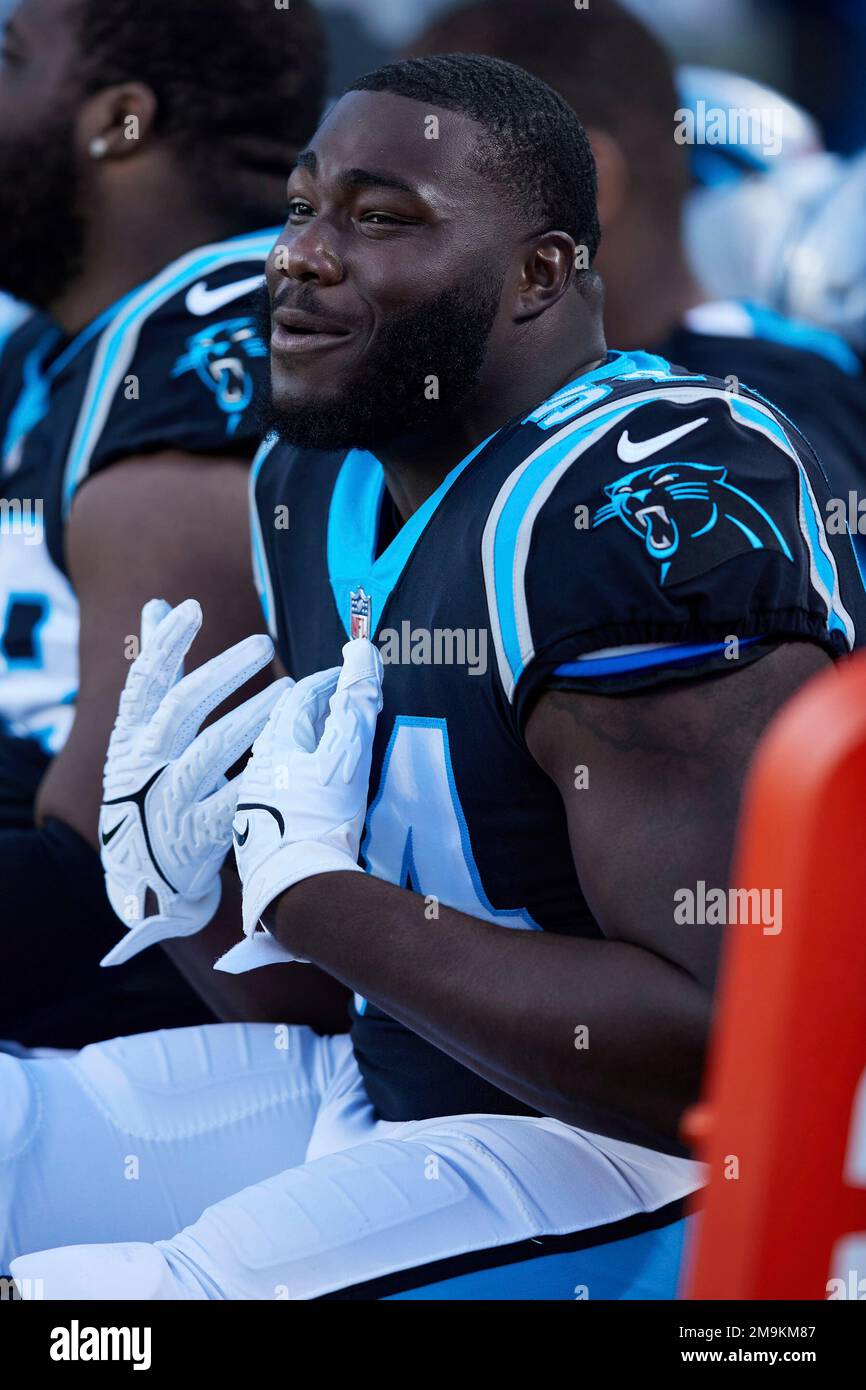 Carolina Panthers defensive tackle Daviyon Nixon (54) sings while sitting  on the bench during an NFL football game against the Denver Broncos,  Sunday, Nov. 27, 2022, in Charlotte, N.C. (AP Photo/Brian Westerholt