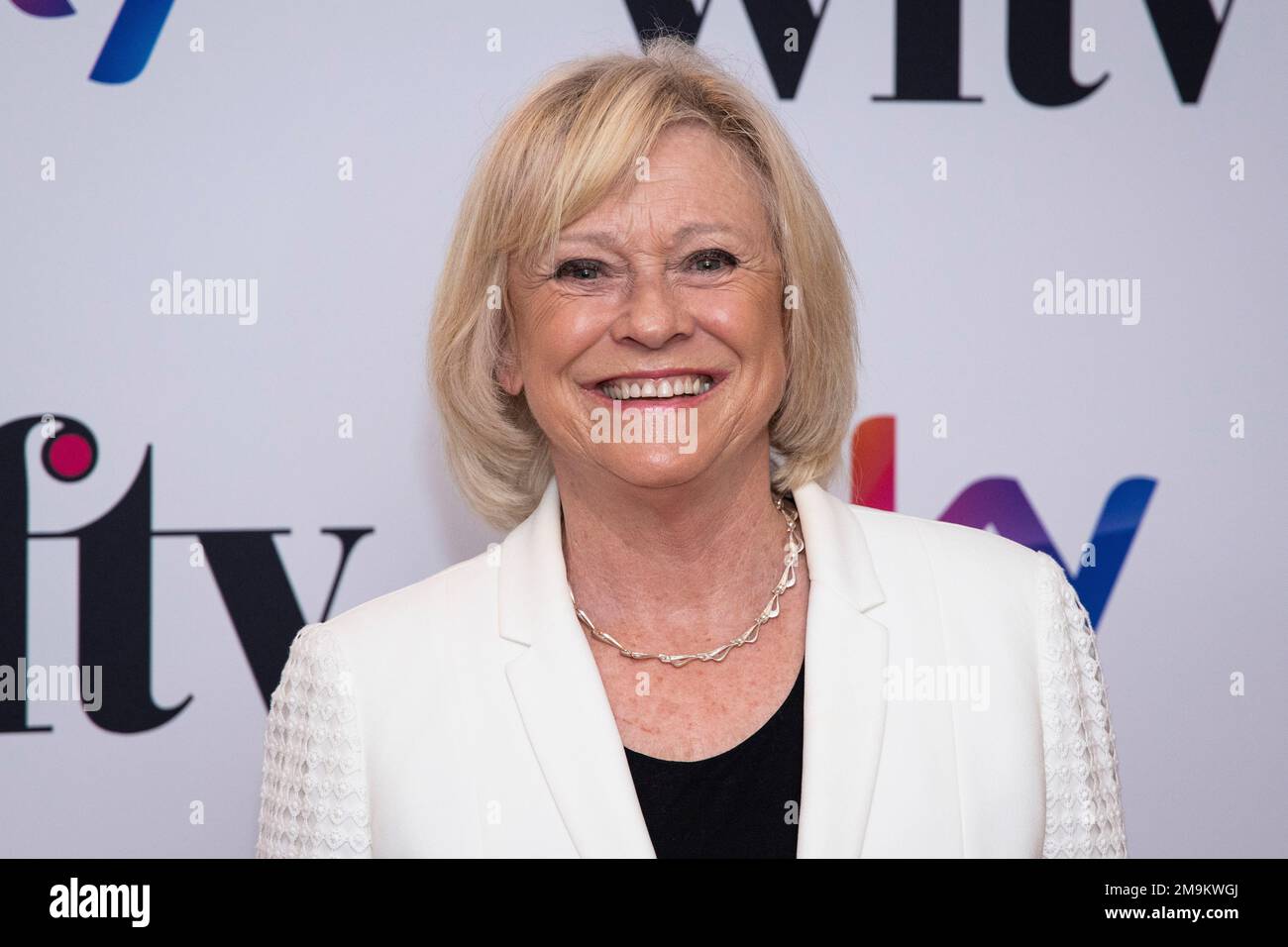 Sue Barker poses for photographers upon arrival for the Britain Women