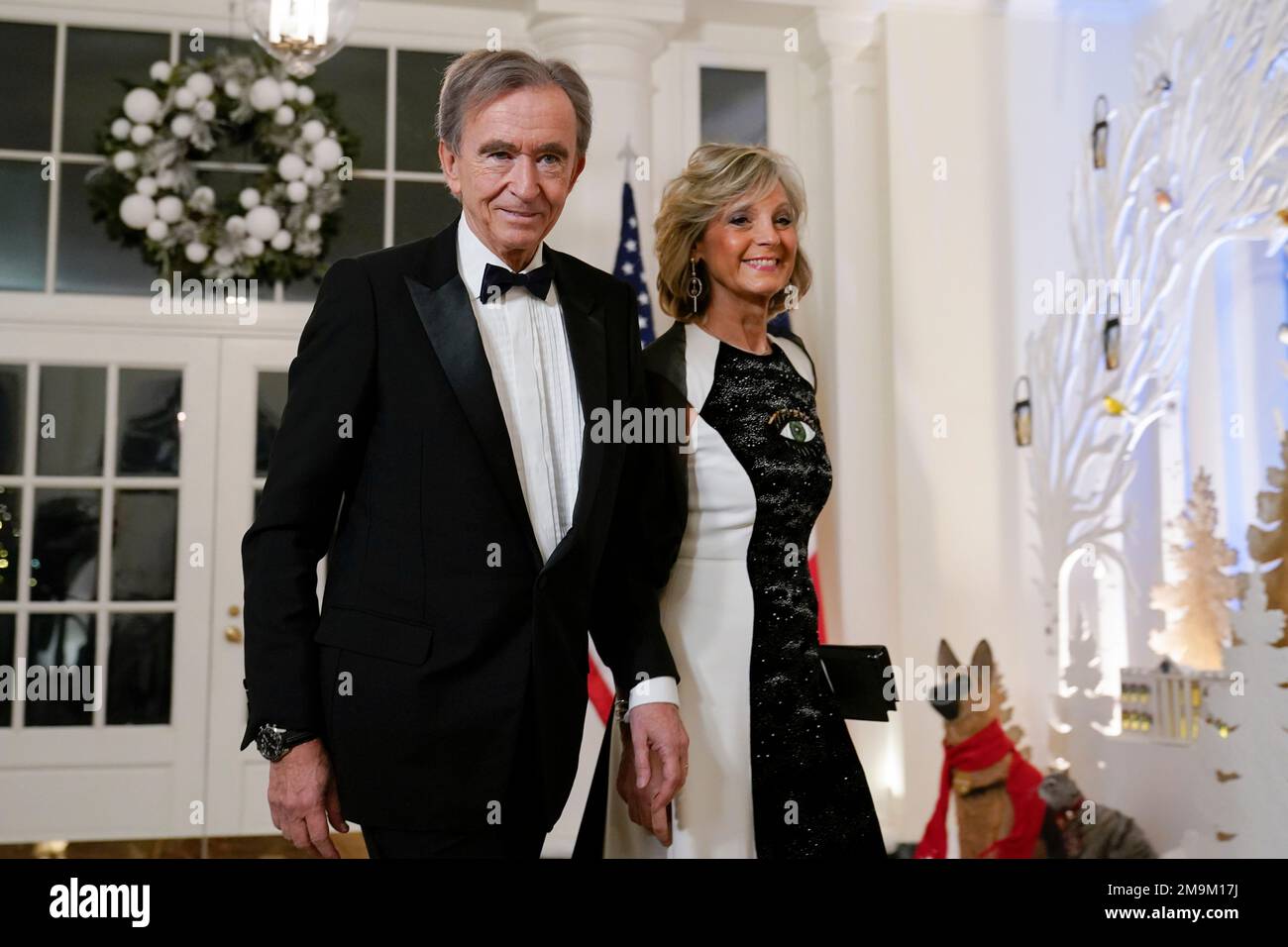 LVMH CEO and Chateau d'Yquem owner Bernard Arnault and his wife Helene pose  during a party with the owners of the 80 'Grands Crus Classes', French  great wines classified according to a