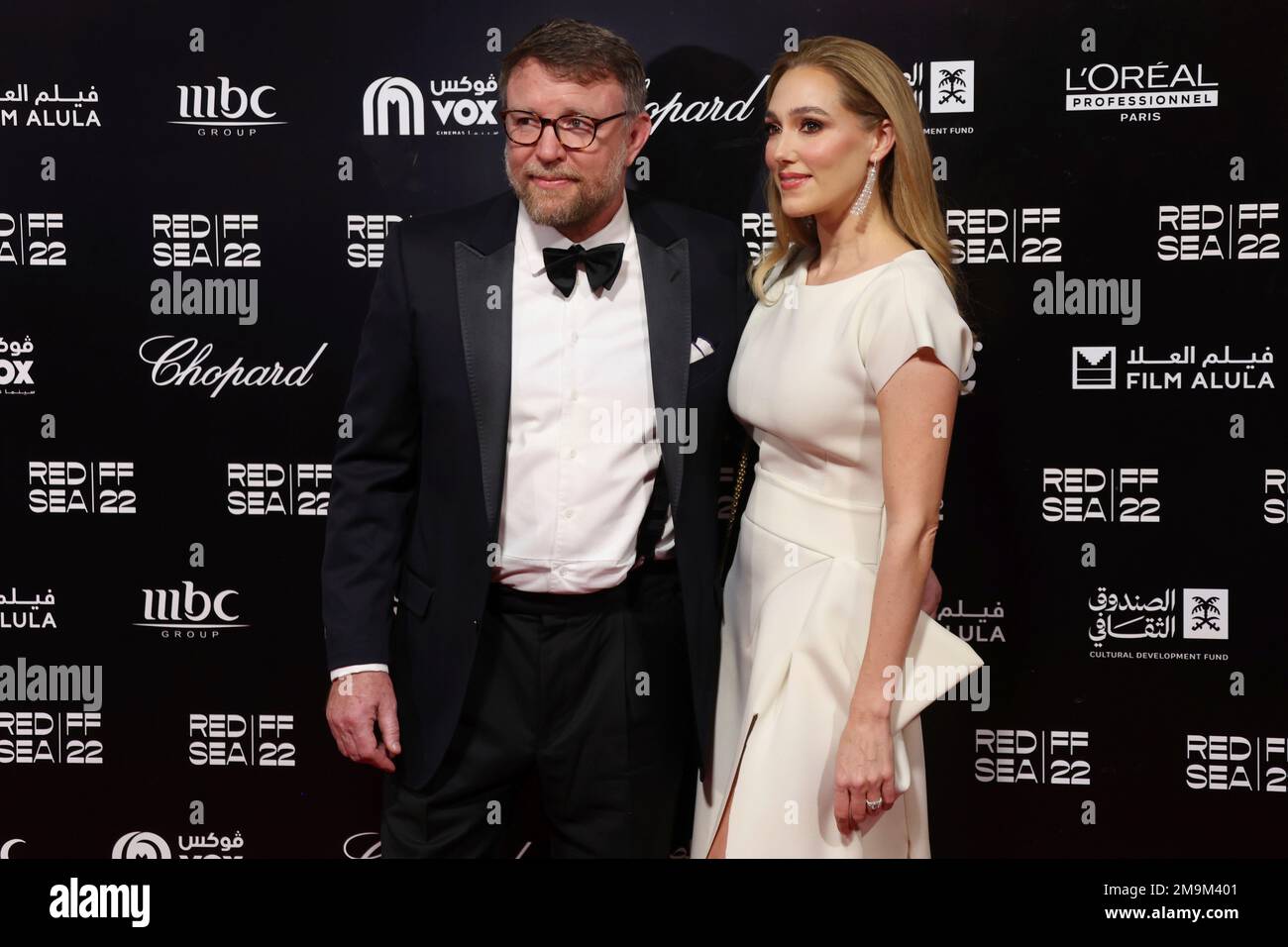 Guy Ritchie and Jacqui Ainsley poses for photographers upon arrival at ...