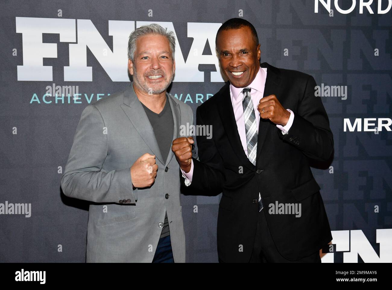 Skechers USA president and company of the year award honoree Michael  Greenberg, left, and Sugar Ray Leonard attend the 36th annual Footwear News  Achievement Awards at Cipriani South Street on Wednesday, Nov.