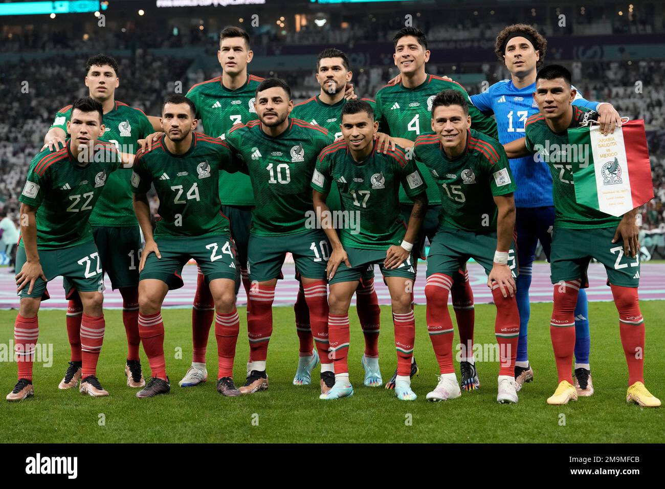 Mexico players pose for a picture before the World Cup group C soccer match  between Saudi Arabia and Mexico, at the Lusail Stadium in Lusail, Qatar,  Wednesday, Nov. 30, 2022. (AP Photo/Moises