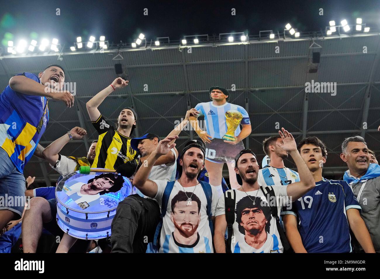 Argentina soccer fans including twin brothers Harold, center left, and